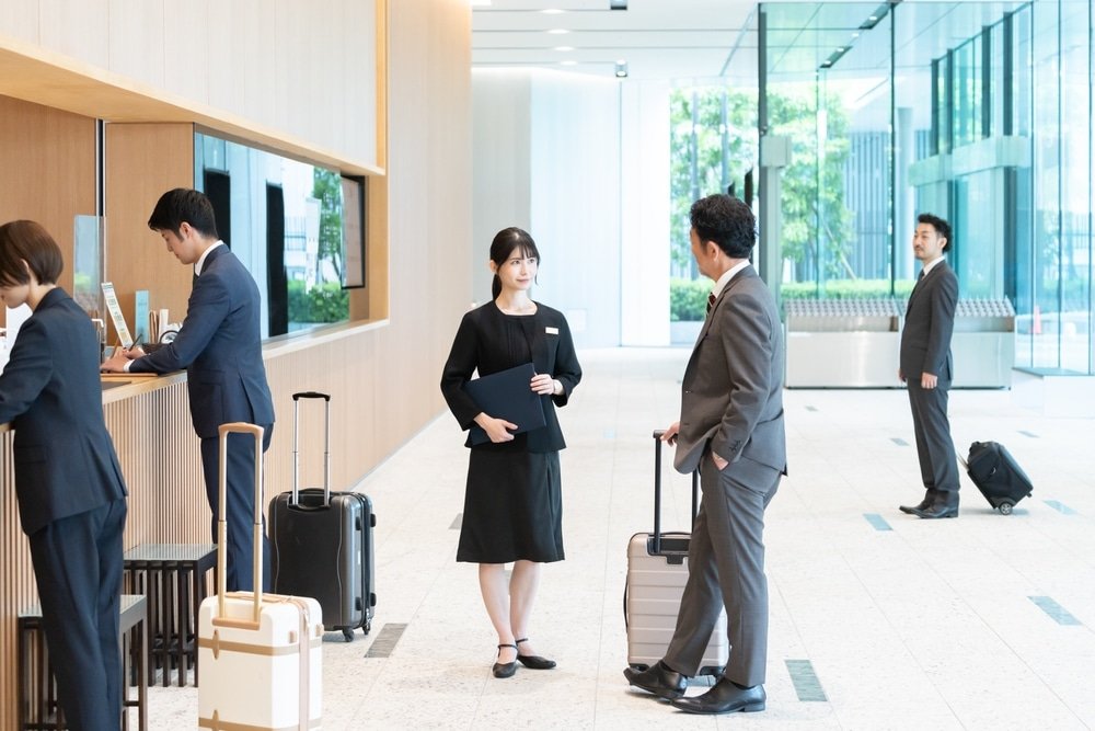 Hotel,Staff,Showing,Guests,Around