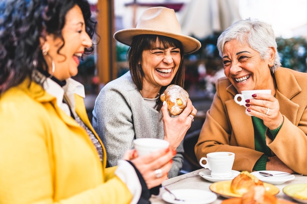Group,Of,Senior,Women,At,Bar,Cafeteria,Enjoying,Breakfast,Drinking